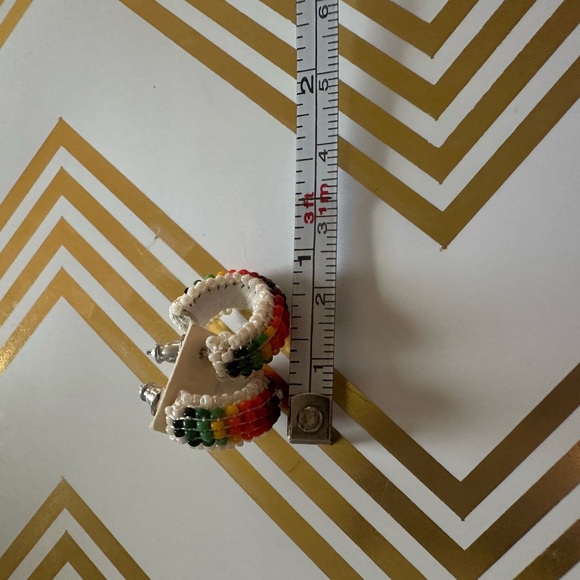 pair of white leather-wrapped rainbow beaded hoop earrings. - Picture 6 of 8